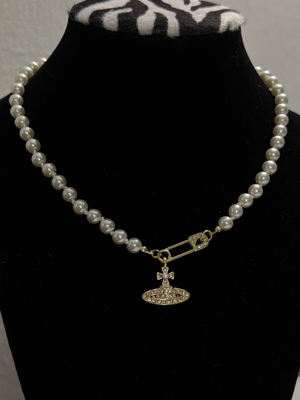 Vivienne Westwood Pearl Necklace with Gold Orb and Safety Pin Charm